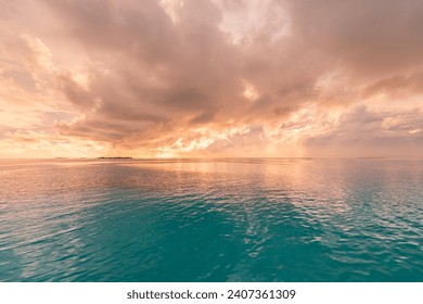 Sea ocean horizon. Skyscape with seascape. Orange gold sunset sky calm water surface, tranquil relaxing sunlight, sun rays. Inspire nature panoramic view. Meditation peaceful sunrise, dream heaven
					