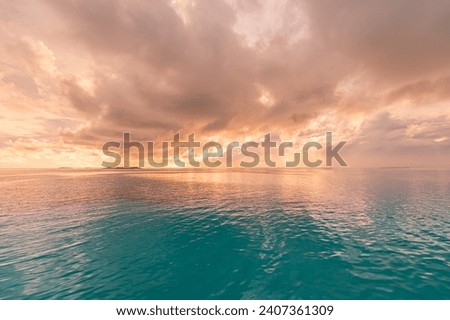 Sea ocean horizon. Skyscape with seascape. Orange gold sunset sky calm water surface, tranquil relaxing sunlight, sun rays. Inspire nature panoramic view. Meditation peaceful sunrise, dream heaven
