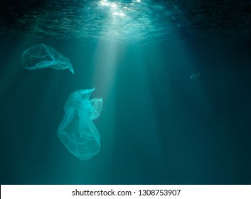 Sea Or Ocean Underwater With Plastic Pollution.