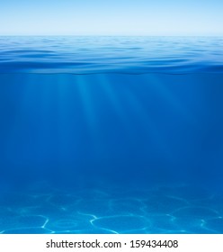 Sea Or Ocean Water Surface With Underwater Split By Waterline