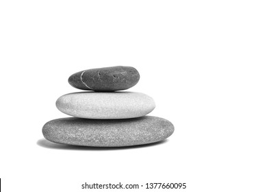 Sea pebble. Group of smooth grey and black stones. Pebbles isolated on white background - Powered by Shutterstock