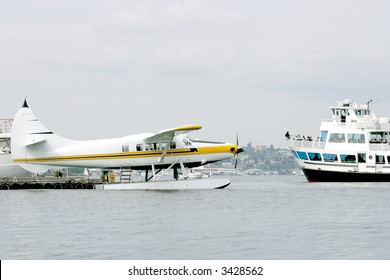 Sea Plane And Cruise Ship On Union Bay Lake, Seattle, USA