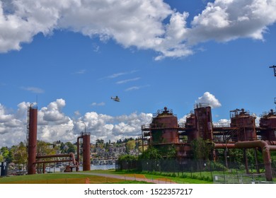 Sea Plane Flying Over Gasworks Park In Seattle, Washington.