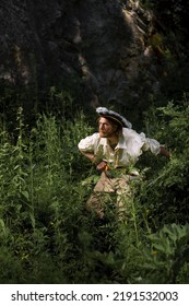 Sea Robber Ship Captain Armed Pirate Goes Through Jungle. Concept Historical Halloween. Filibuster Cosplay