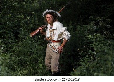 Sea Robber Ship Captain Armed Pirate Goes Through Jungle. Concept Historical Halloween. Filibuster Cosplay