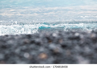 
mar ​ ​ olas sobre piedras