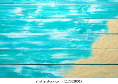 Sea Sand On Blue Wooden Floor,Top View With Copy Space