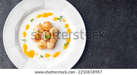 sea scallops fried seafood healthy meal food snack on the table copy space food background rustic top view