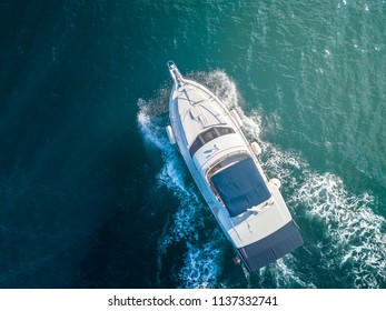 Sea Service Team In Fast Speed Motor Boat Top Overhead View