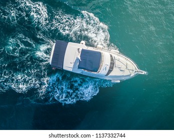 Sea Service Team In Fast Speed Motor Boat Top Overhead View