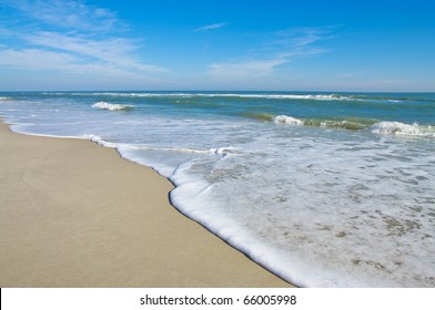 Sea Shore: Gentle waves reach the sand at Assateague Island National Seashore.