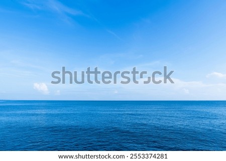 Sea and Sky blue ocean by beach background,Backdrop Summer nature banner Sunny day clear sky,cloud with light reflection on water texture,Landscape winter sea beach for wallpaper