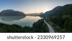 Sea to Sky Highway on Pacific Ocean West Coast. Aerial Panorama. Sunny Colorful Sunrise. Located in Howe Sound between Vancouver and Squamish, British Columbia, Canada.