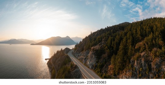 Sea to Sky Highway on Pacific Ocean West Coast. Aerial Panorama. Sunny Colorful Sunset. Located in Howe Sound between Vancouver and Squamish, British Columbia, Canada. - Powered by Shutterstock