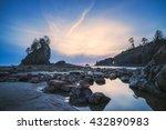 sea stack in sunset time with blue and purple light,scenic view of second beach in mt Olympic National park,Washington,USA.