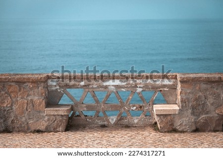 Sea stone traditional fence with benches