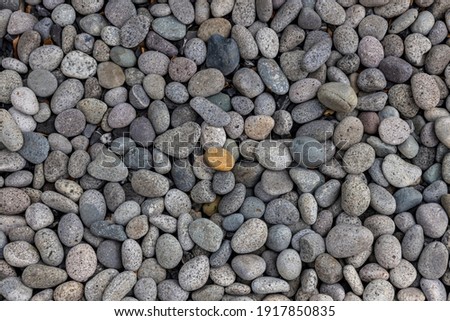 Sea stones background. Colorful small pebbles or stone in garden. Flat lay of sea stones texture background. Abstract shape pattern from nature.