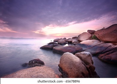 Sea stones at sunset in hong kong.
