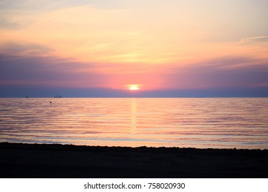 Sea in the Sunsrise With Clouds and Waves