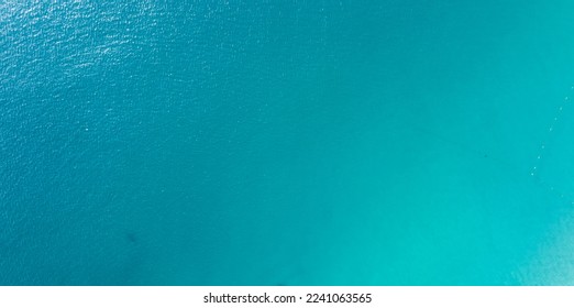 Sea surface aerial view,Bird eye view photo of blue waves and water surface texture Blue sea background Beautiful nature Amazing view sea background	