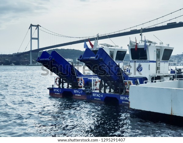 Sea Surface Cleaning Boats that are belong to Istanbul\
Municipality, waiting at Bosporus - January 25 2019 Istanbul Turkey\
