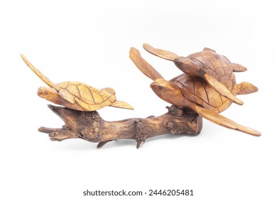 Sea Turtle turtles hand crafted wood carving sculpture statue swimming on drift wood isolated on white background flippers extended out beautiful craftmanship with detail and texture, natural finish - Powered by Shutterstock