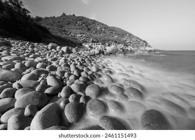 Sea view from pebble beach. Black and white photo. - Powered by Shutterstock