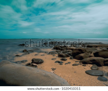 Image, Stock Photo Beach with orange rocks in a sunset, ribadeo, lugo, galician, spain