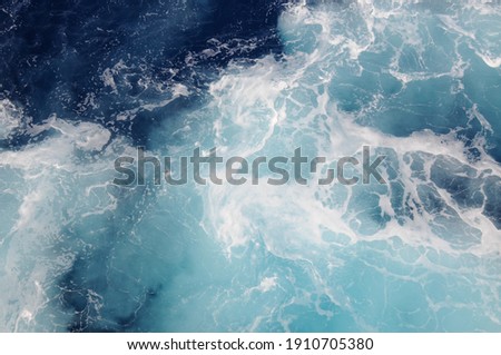 Sea water with air swirls in the Eastern Mediterranean Sea creating blue and white patterns
