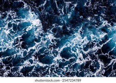 Sea water surface background. Aerial view of vibrant foamy water. Can be used in covers, packaging, posters, textures, brochures, art and design projects. Picturesque nature background image. - Powered by Shutterstock