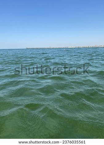Sea water waves and sunny weather