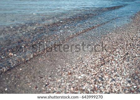 Similar – Lots of colorful stones on the beach