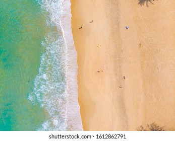 Sea wave beach turquoise water with tourist summer vacation concept aerial view - Shutterstock ID 1612862791