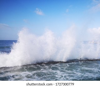 Sea Waves Crashing Against The Tidal Pool Wall. At St James, Cape Town.