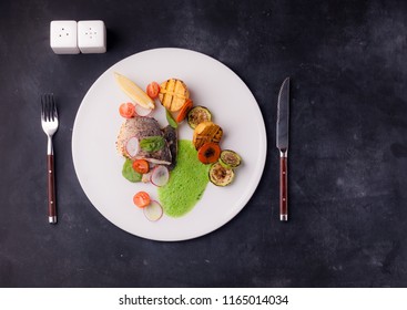Seabass fillet with vegetables and molecular foam - Shutterstock ID 1165014034