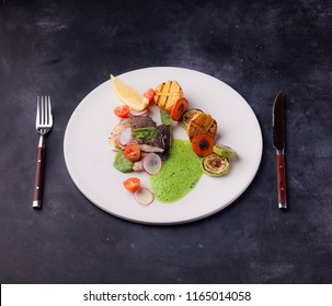 Seabass fillet with vegetables and molecular foam - Shutterstock ID 1165014058