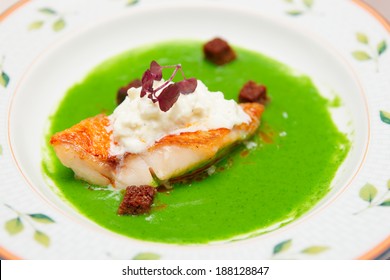 Seabass With Herbs And Spinach Puree In Plate, Close-up