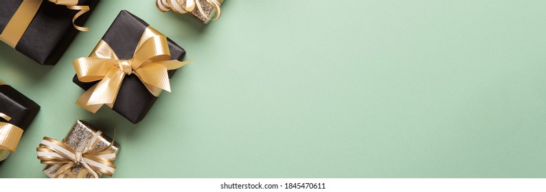 Seafoam Green Paper Banner With Black Gift Boxes And Golden Bows. Shopping Discount Promotion.