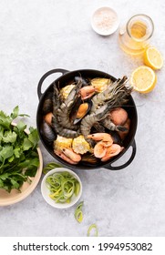 Seafood boil ingredients ready for cooking, culinary recipe image, top down view 