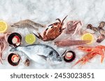 Seafood. Fresh fish and sea food on ice, overhead flat lay view. A background for a market or a restaurant menu, with copy space