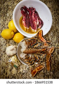 Seafood getting marinated for the grill - Shutterstock ID 1866951538