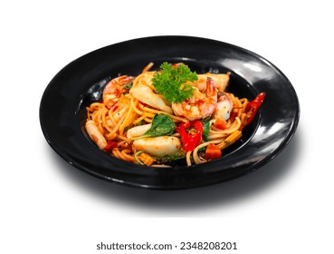 Seafood Infused Stir Fried Spaghetti : component spaghetti pasta stir fried with vegetables herb spicy mix seafood stir fried shrimp squid  with basil and chilli pepper on white background, Thai style