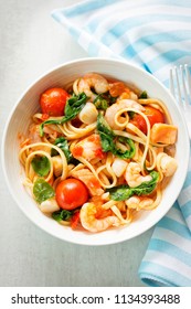 Seafood Linguine With Prawns, Scallops And Salmon, Spinach And Tomatoes