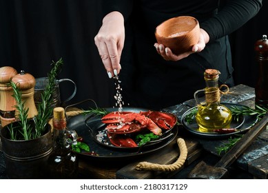 Seafood. Lobster Claws On A Plate In The Hands Of The Chef. Food Banner.