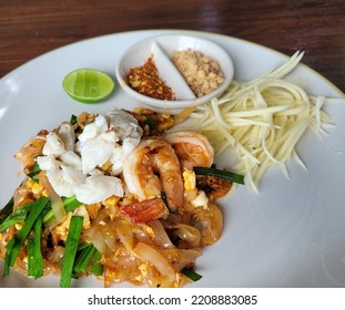 Seafood Pad Thai With Shrimp And Crab On Top