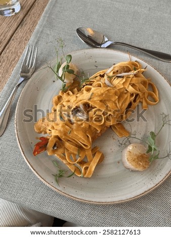 Seafood pasta lunch by seaside