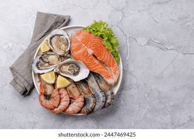 Seafood Platter Delight: Shrimps, Salmon, Oysters Galore. Flat lay with copy space - Powered by Shutterstock