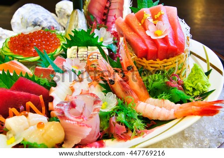 A lot seafood sashimi luxury raw food Japanese style on ice.