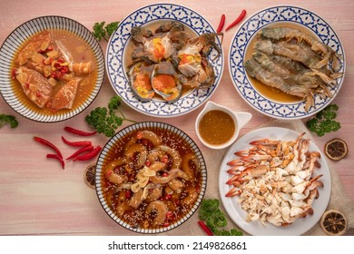 Seafood Sashimi set, shrimp, Mantis shrimps, blue crab,salmon marinated in soy sauce and steamed blue crab served with spicy seafood dipping sauce.