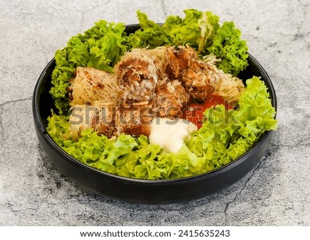 seafood spring rolls or cha gio ghe with lettuce leaf served in dish isolated on grey background top view of singapore seafood Imagine de stoc © 